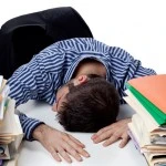 businessman sleeping on his desk Napping Improves Memory